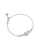 KENDRA SCOTT- Ari Rhodium Heart w/Arrow Tennis Bracelet in Pink Opal Resin