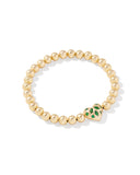 KENDRA SCOTT- Holland Gold Heart Stretch Bracelet in Green Crystal